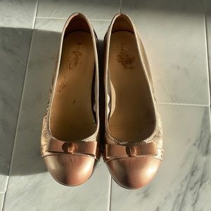 Rose gold Cole Haan ballet flats. Nike air sole.